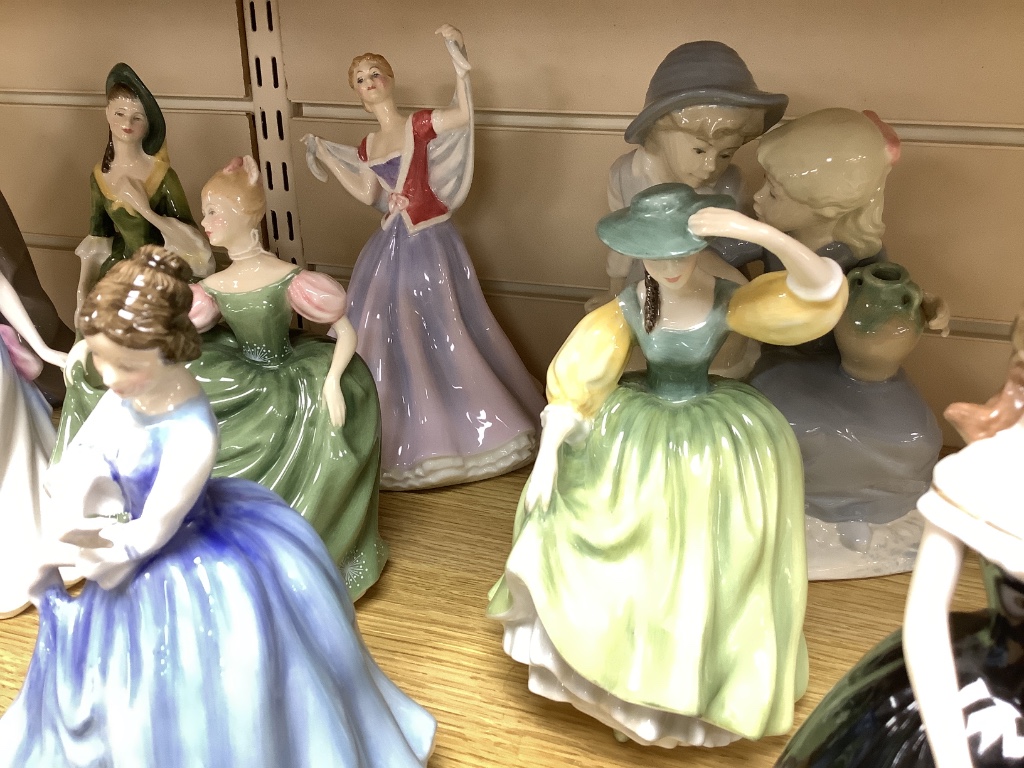 A group of ceramic figurines, various